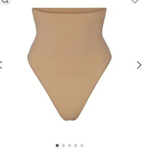 NWOB SKIMS CORE CONTROL THONG IN OCHRE